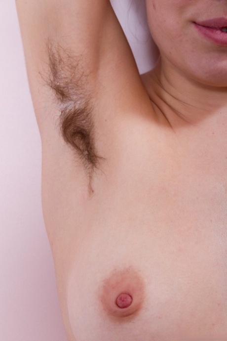 Small titted Gretta does striptease for solo hairy pussy & armpits exhibition