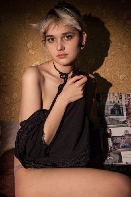 Adorable Russian spinner Wivian showcases her puffy pussy in the nude