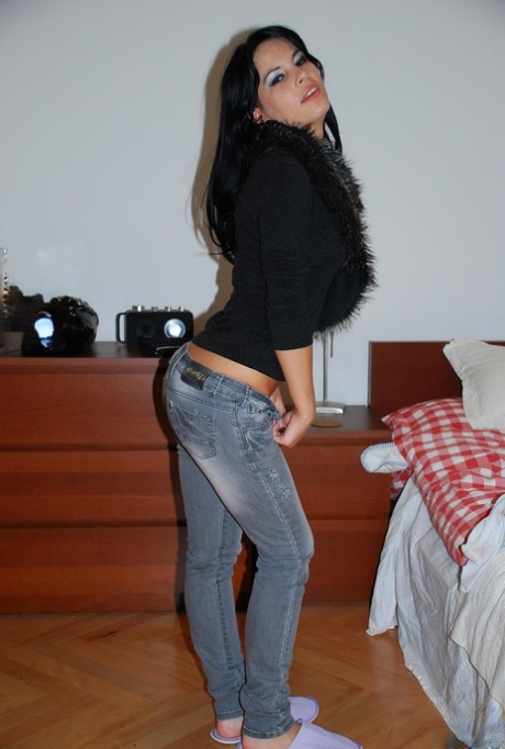 Slutty sexy teen Amabella posing in schoolgirl uniform before masturbation