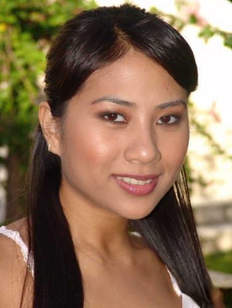 Lovely Asian chick Nyomi Marcela gives nice handjob and boobjob outdoors