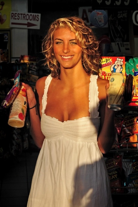 Dazzling blonde Marilyn Winters flashing her big tits while on vacation
