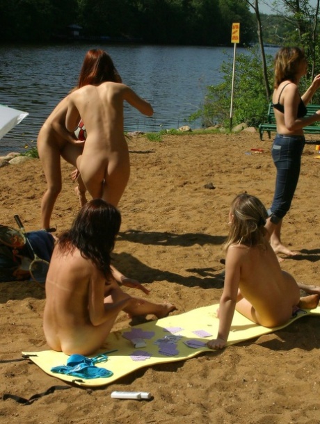 Naughty skinny babes show off their small tits outdoors while naked