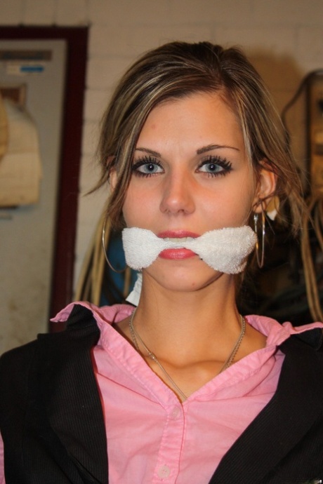 Skinny amateur blonde Irena posing bound to a chair in the basement