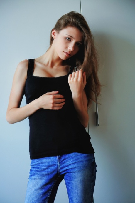 Brunette teen Mila Azul exposes her gorgeous big tits and poses nude