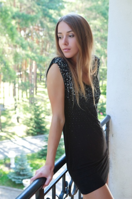 Cute Estonian teen Lina Diamond unveiling her small tits, pussy & feet outside