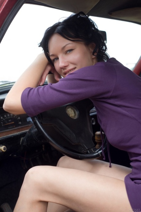 Glamorous brunette Loreen A undressing and posing naked outdoors