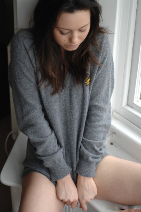 Sexy brunette Brionie W doffs her white undies and flaunts her awesome bush