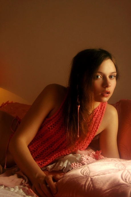 Shy teen babe Anna S displays her long pubic hair and small tits