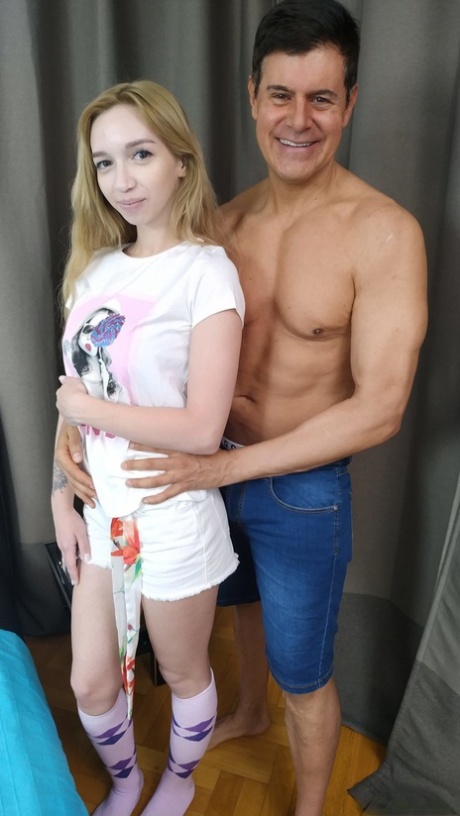 Petite teen Leyla Fiore unveils her nice big tits and poses with her lover