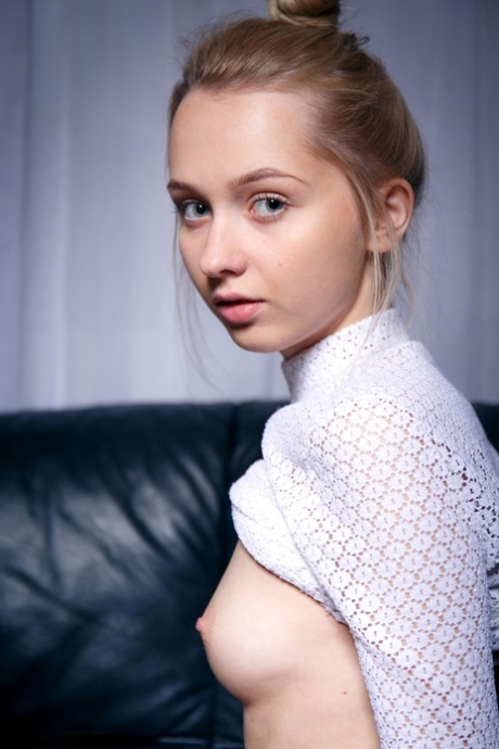 Sweet skinny teen Bernie unveils her tasty muff & adorable titties on a couch