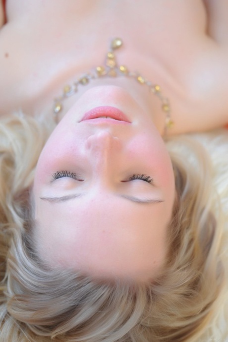 Gorgeous blonde teen Eriska A reveals her bald vagina and hot ass