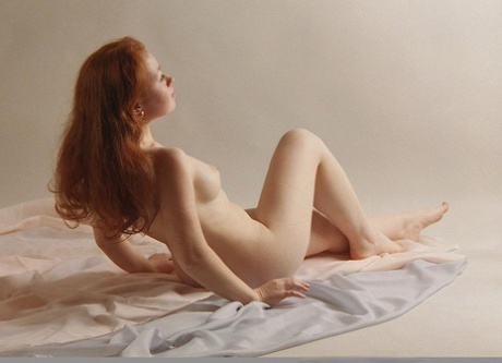 Young goddess Ginger shows her beautiful teen tits and her big booty