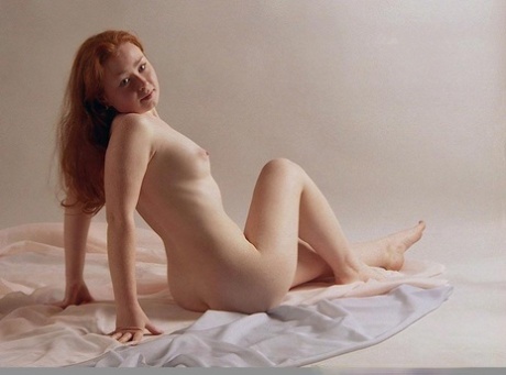 Young goddess Ginger shows her beautiful teen tits and her big booty