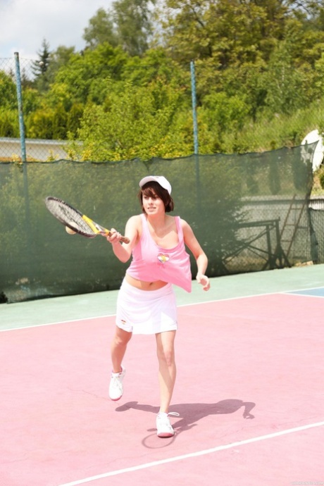 Lesbian teen tennis players undress & play with each other's twat on the court