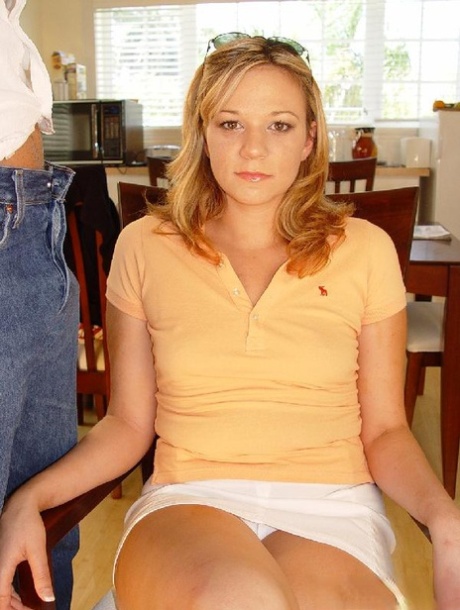 Sexy blonde Deja flaunts her legs before sucking a huge boner up close