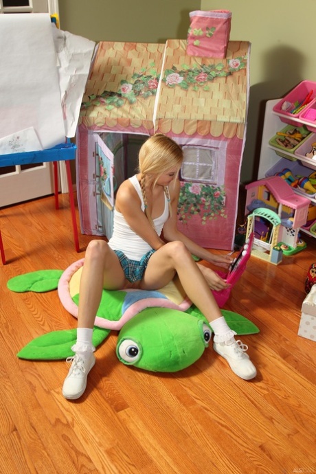 Blonde German teen Franziska Facella exposes her thin body and poses