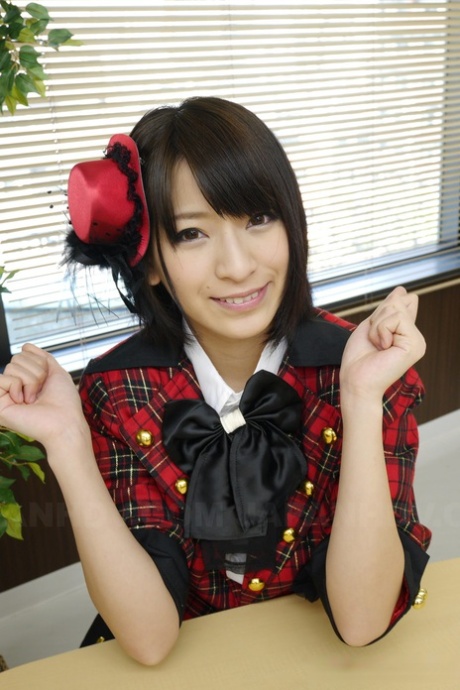 Japanese schoolgirl in a plaid coat Ruri Narumiya gets her twat licked