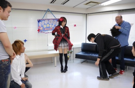 Japanese schoolgirl in a plaid coat Ruri Narumiya gets her twat licked
