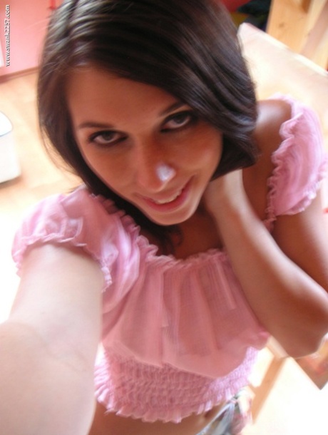 Brunette teen with small tits Jacinda flaunts her body in her bedroom