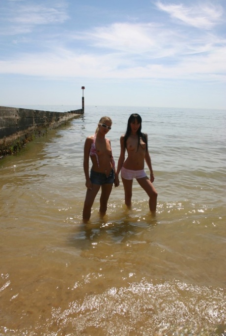Petite lesbian MILF Suzie Best & her skinny GF show their small tits outdoors