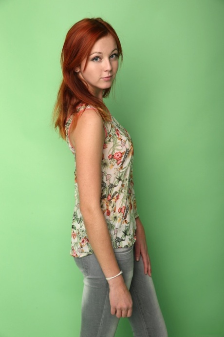 Redheaded teen Elen Moor showing off her sweet natural tits & her shaved twat