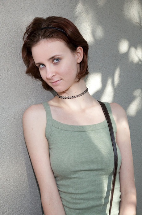 Innocent amateur babe Jay Taylor flashes her panties while posing outside