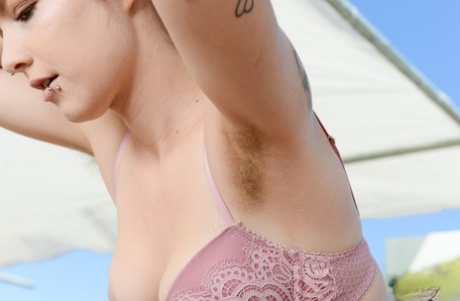 Petite teen Apricot Pitts strips & spreads her extensively hairy pussy outside
