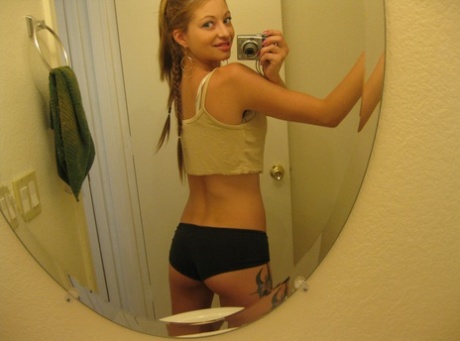 Beautiful amateur teen Dixie takes selfies of her hot body in the mirror