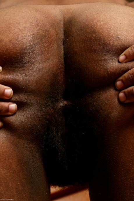 Chubby ebony Alexis showing off her big boobs, sexy feet & hairy vagina