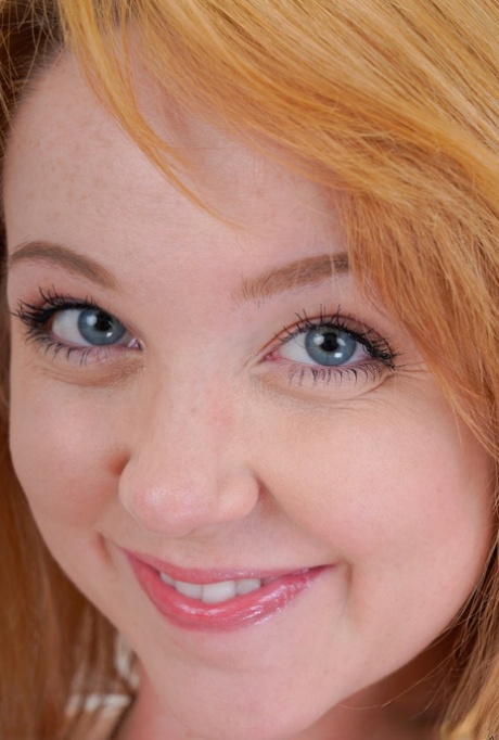 Sexy ginger Nikole Nash spreading her innocent pussy and round butt cheeks