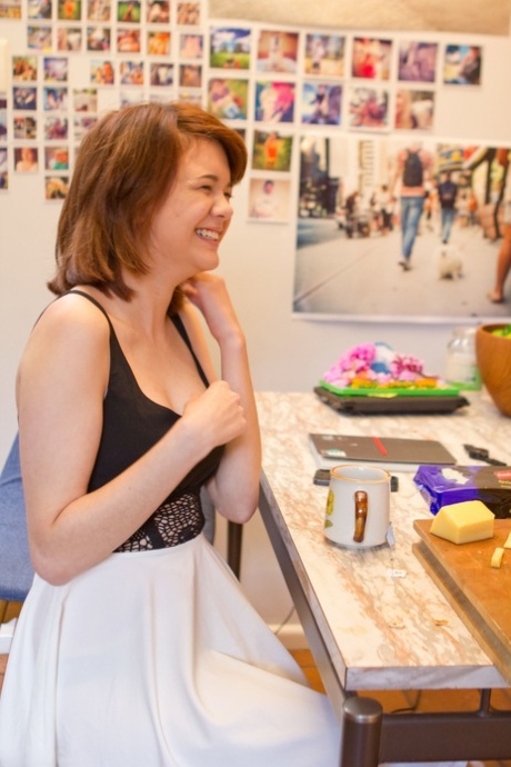 Sexy amateur Lily Rei unveils her small tits and her shaved pussy