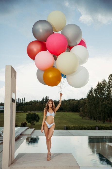 Skinny pornstar Tiffany Tatum gives a blowjob before getting blacked poolside