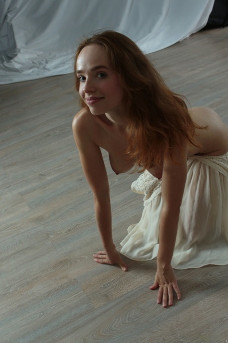 Gorgeous ginger teen Rinna Ly reveals her cute breasts and poses naked