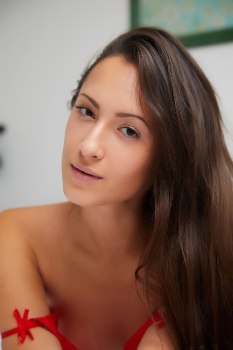American cutie Mishel Dark poses in her red lingerie and strips naked