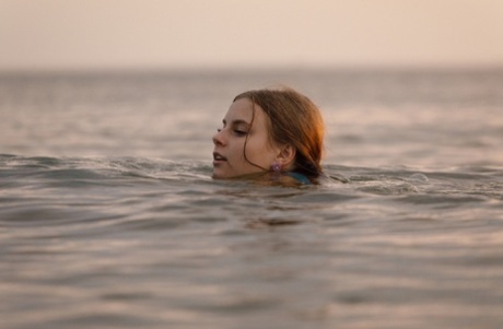 Amateur beauty Ulyana Orsk teasing with her spectacular booty on the beach