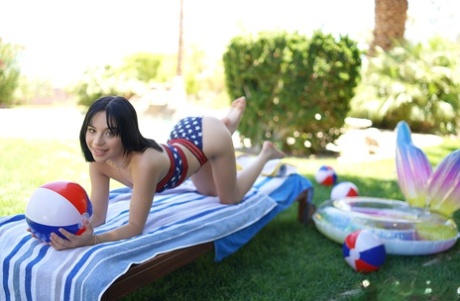 Teen with small boobs masturbating and fucking a huge dick outdoors