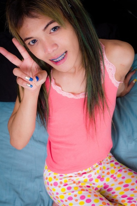 Cute skinny tranny Nat flaunts her big dick and spreads her ass cheeks