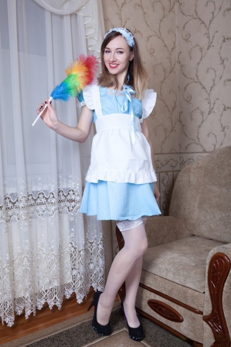 Playful teen in stockings Yuliya gets her tight hairy pussy dicked on a sofa