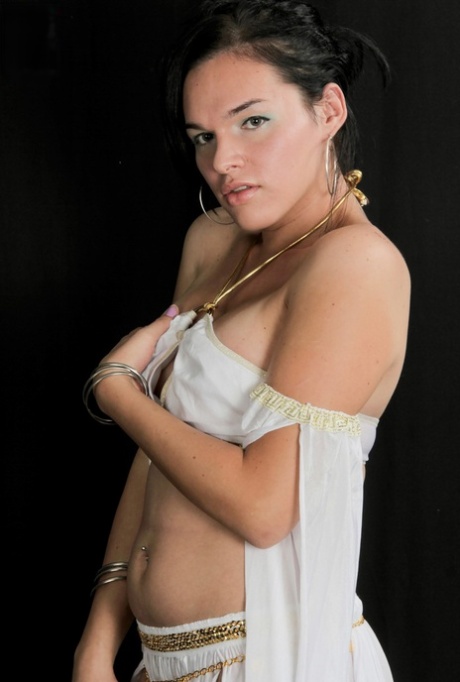 Gorgeous shemale Ana Venus unveils her small dick in a sexy striptease