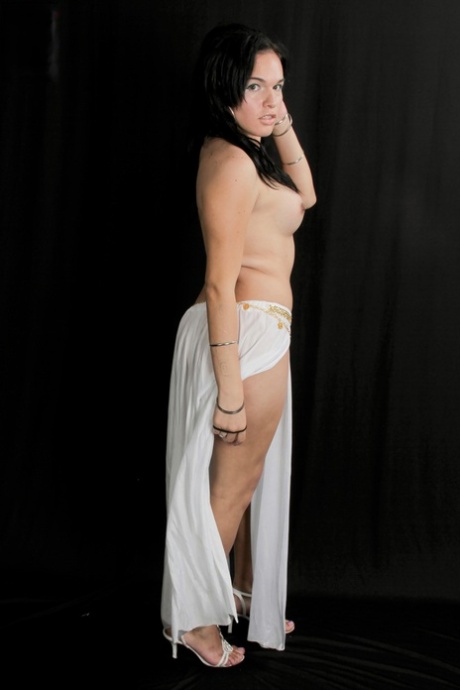 Gorgeous shemale Ana Venus unveils her small dick in a sexy striptease