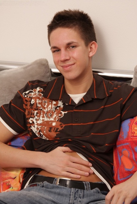 Hot gay Caucasian brunette Vinny strips and plays with his stiff uncut dick