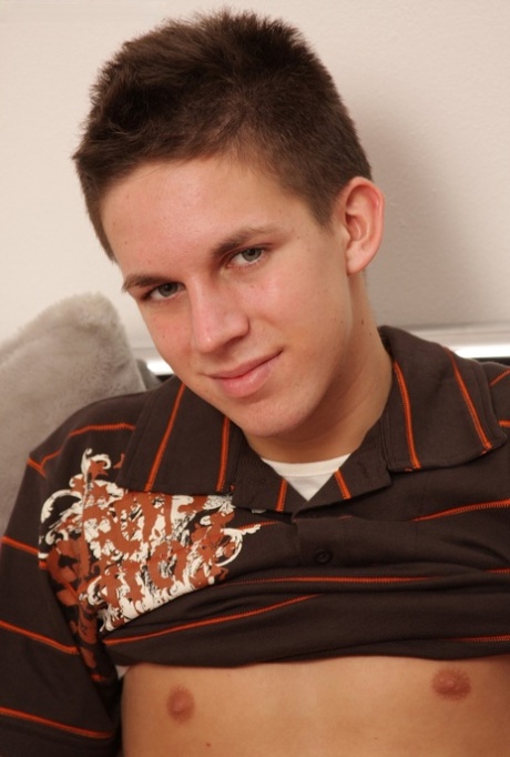 Hot gay Caucasian brunette Vinny strips and plays with his stiff uncut dick