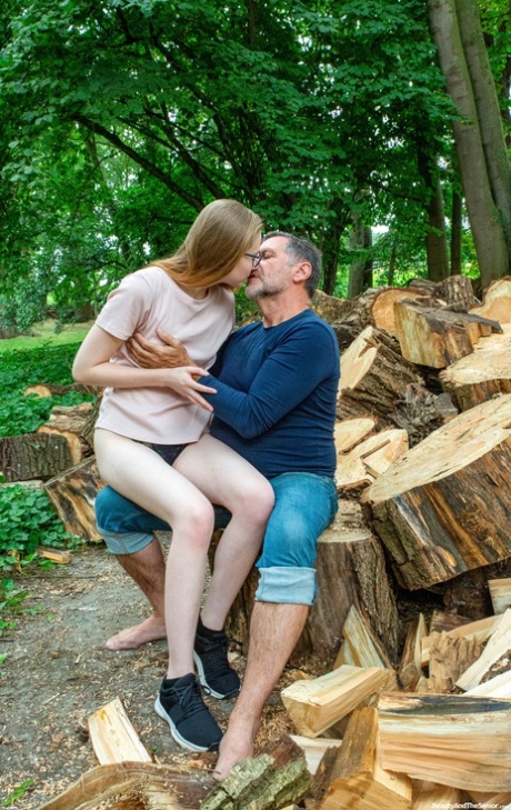 Lustful teen Abela getting fucked hard by an old man outdoors in the woodpile