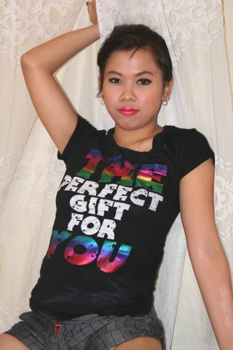 Luscious amateur Asian Nikki Coloma humps a rock-hard dick & takes a facial