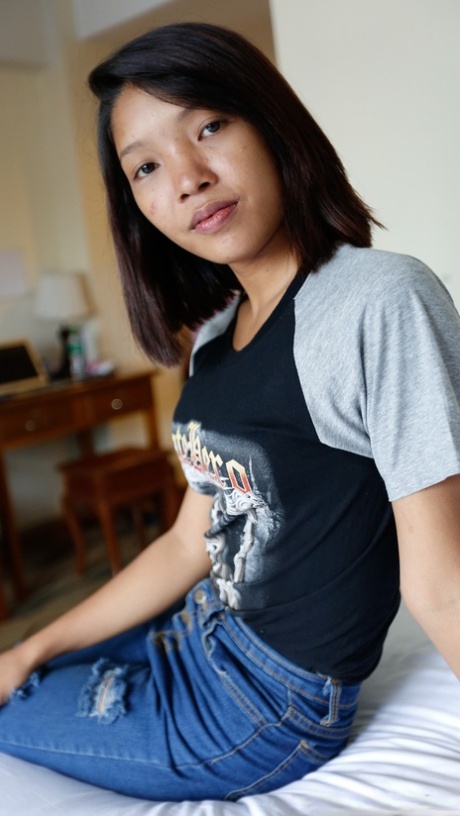 Sweet Asian girl Rona flaunts her small tits & takes a boner in her hairy twat