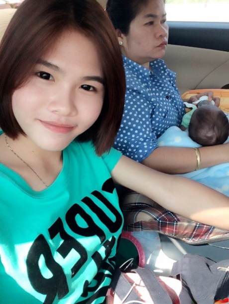 Pretty Asian shemale Gogo posing topless and in hot outfits in sexy selfies