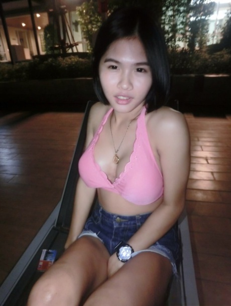 Pretty Asian shemale Gogo posing topless and in hot outfits in sexy selfies