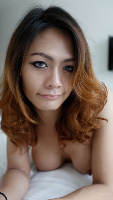 Sexy Asian tranny shows off her big tits and long dick before POV anal sex