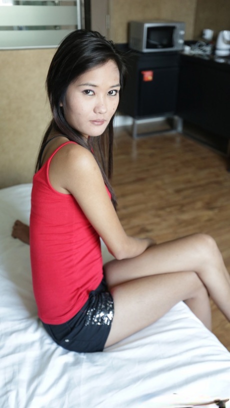 Tiny Asian amateur Ann D flaunts her bald cunt & small tits & gets a creampie
