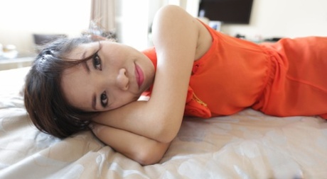 Petite Asian woman Hana poses & strips before getting her hairy twat dicked